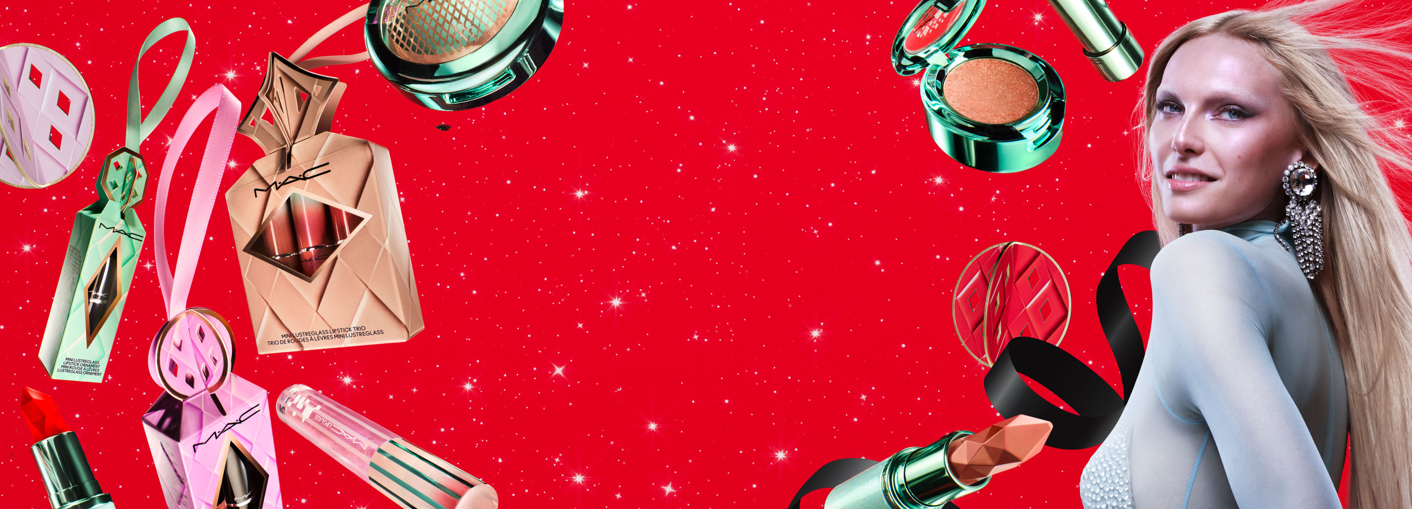 MAC Holiday gifts on red background with model 